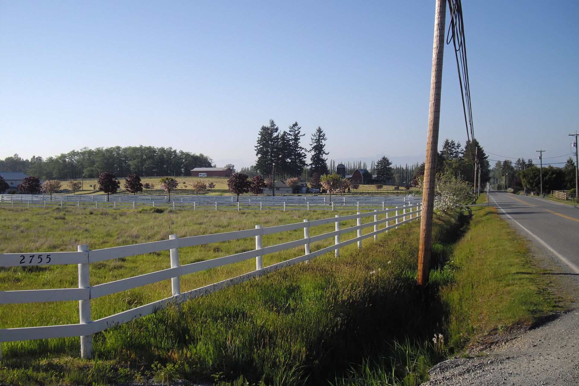 Rural acreage and white fencing at 216 Street and 27 Avenue in south Langley
