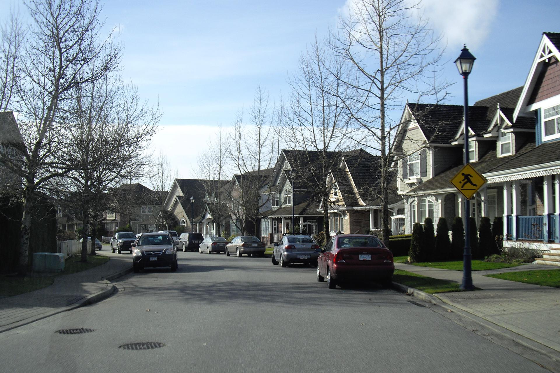 Homes with front porches along Murrays Crescent in Murrayville, Langley