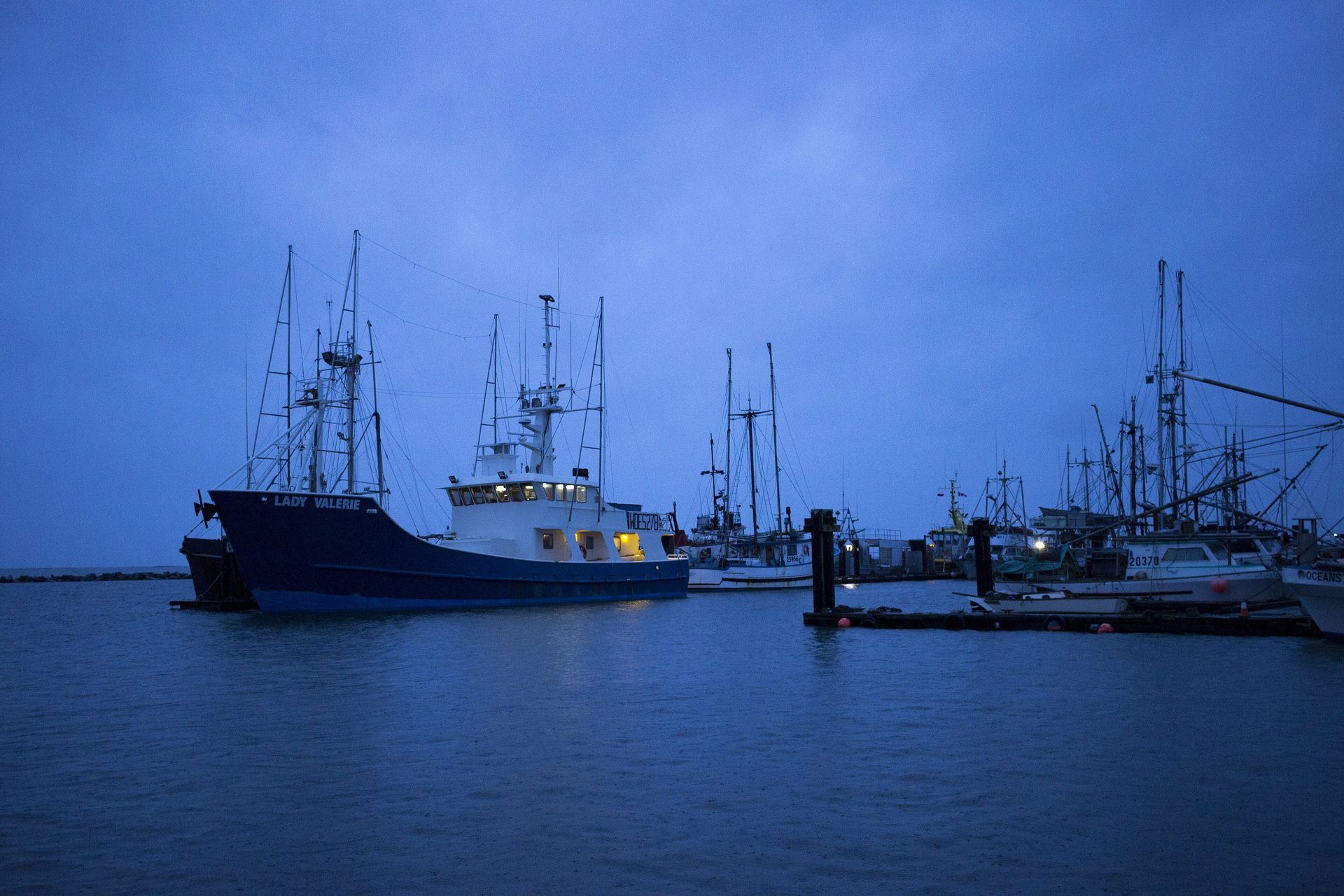 Fishing vessels at Steveston's fishing wharf at dusk
