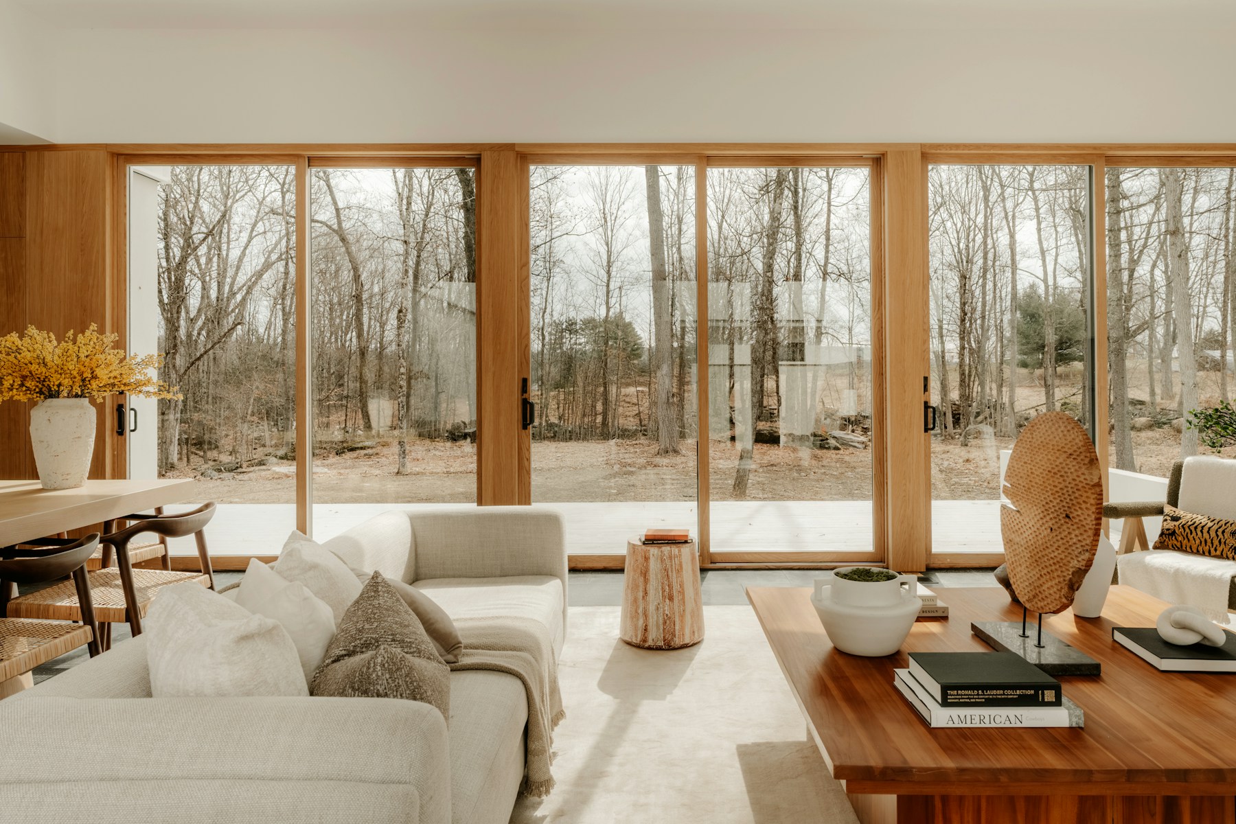 Bright living room with floor-to-ceiling windows