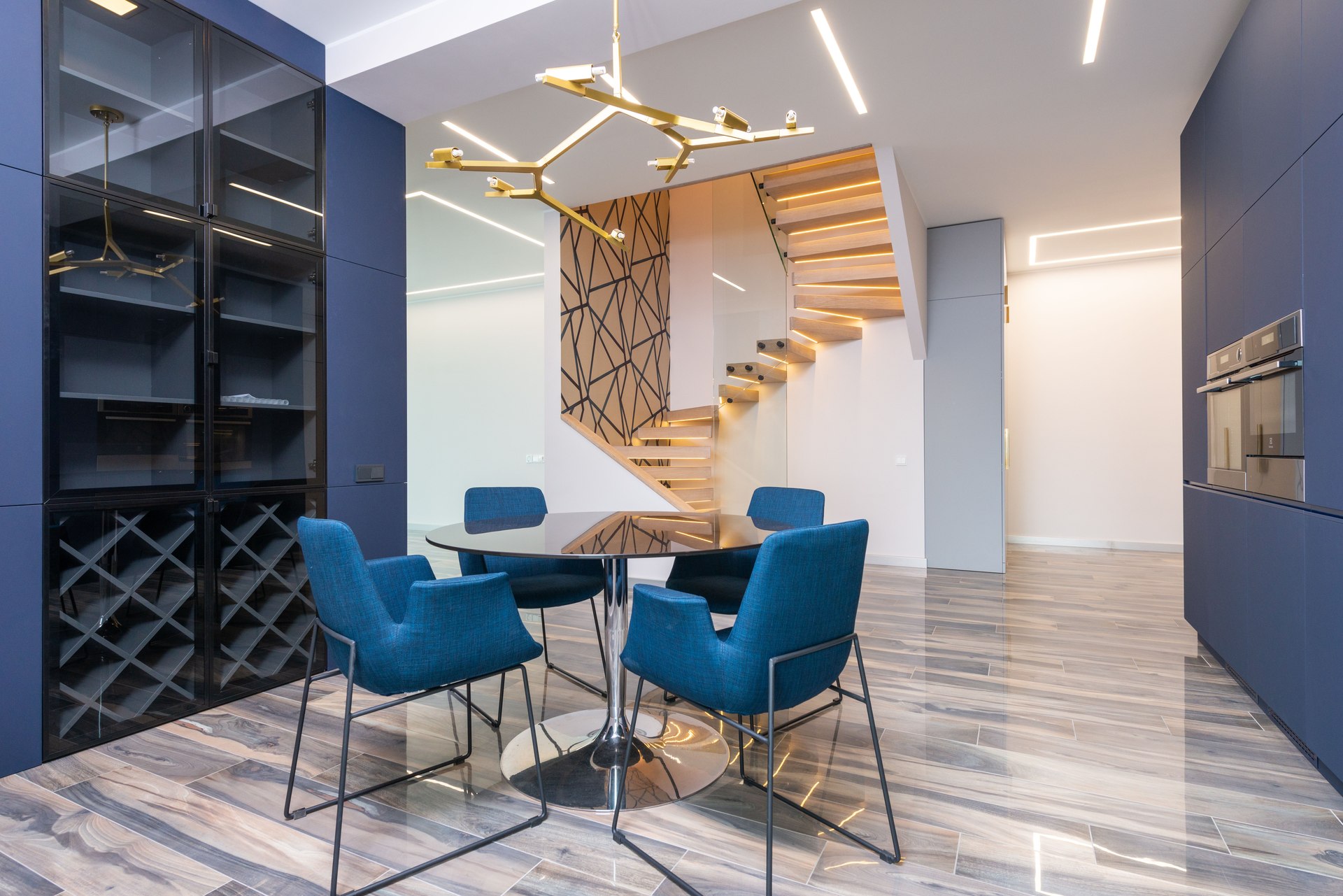 Open dining area with blue chairs