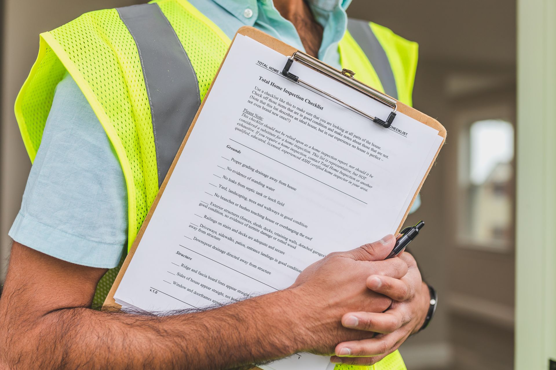 Home inspector holding an inspection checklist