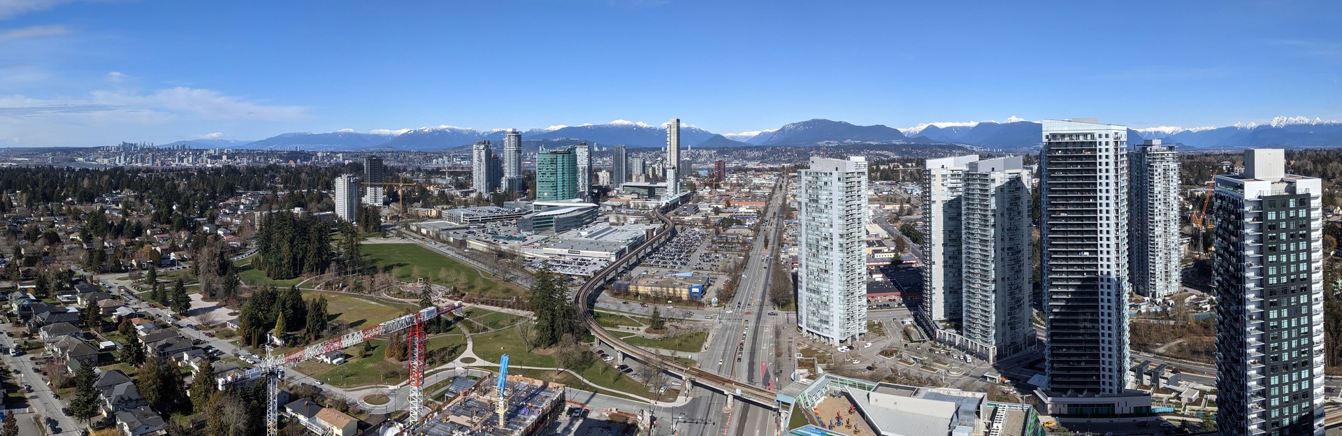 Surrey City Centre and Metro Vancouver skyline viewed from atop Hub One